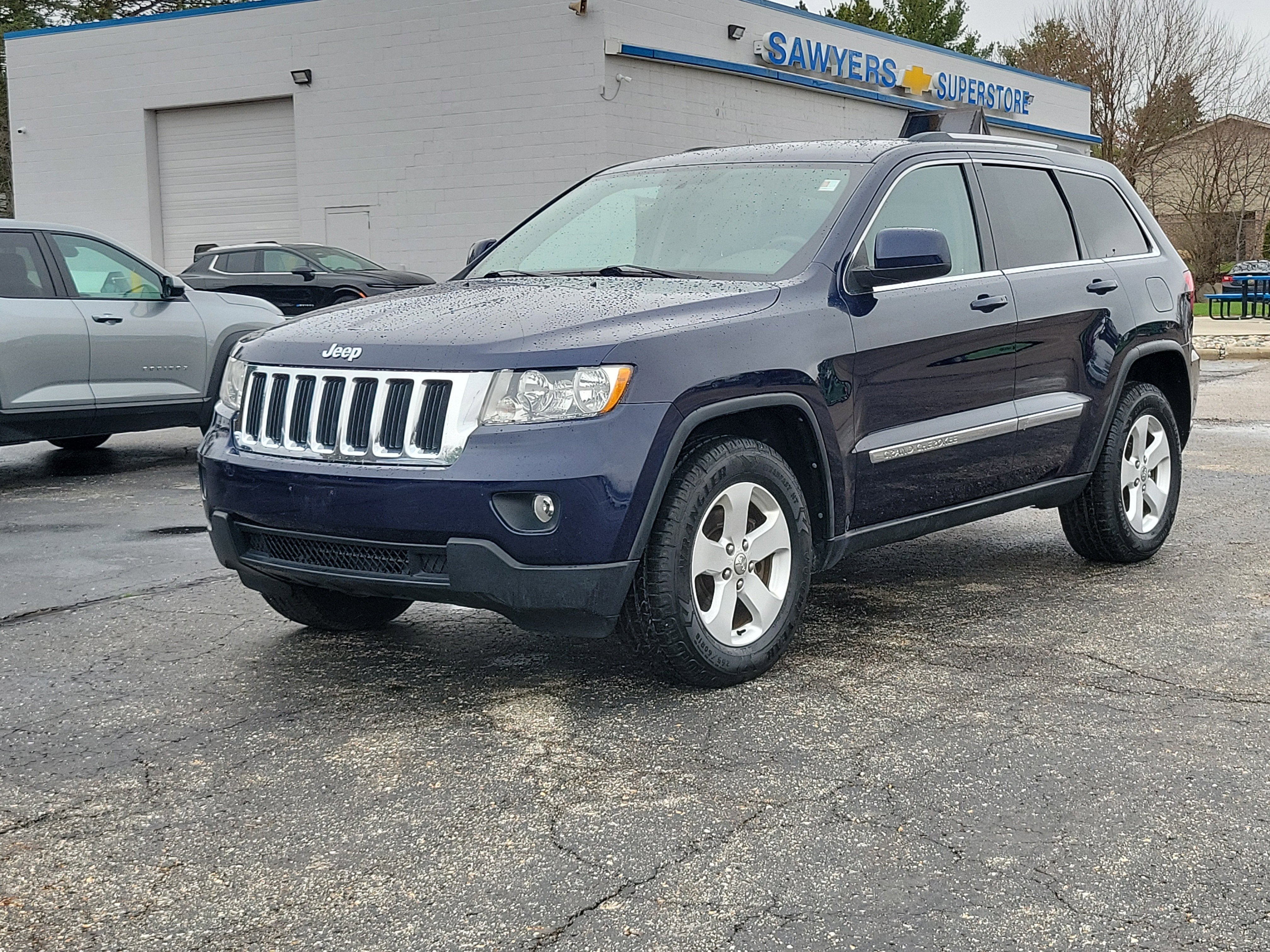 Used 2013 Jeep Grand Cherokee Laredo X with VIN 1C4RJFAG4DC506292 for sale in DeWitt, MI