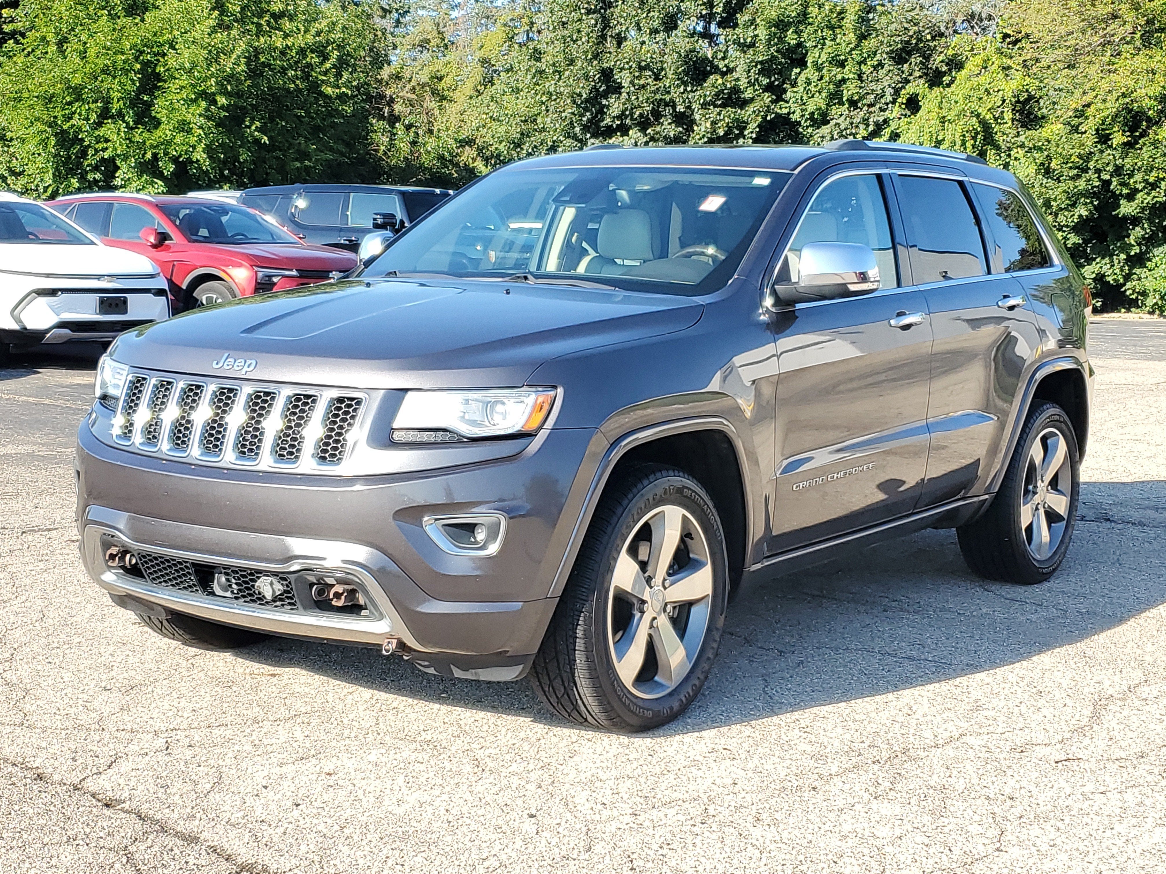 Used 2014 Jeep Grand Cherokee Overland with VIN 1C4RJFCG6EC219373 for sale in DeWitt, MI